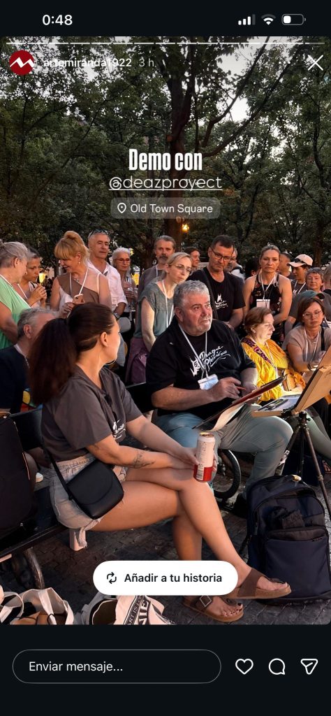 Publicación de una demostración de pintura al aire libre con público